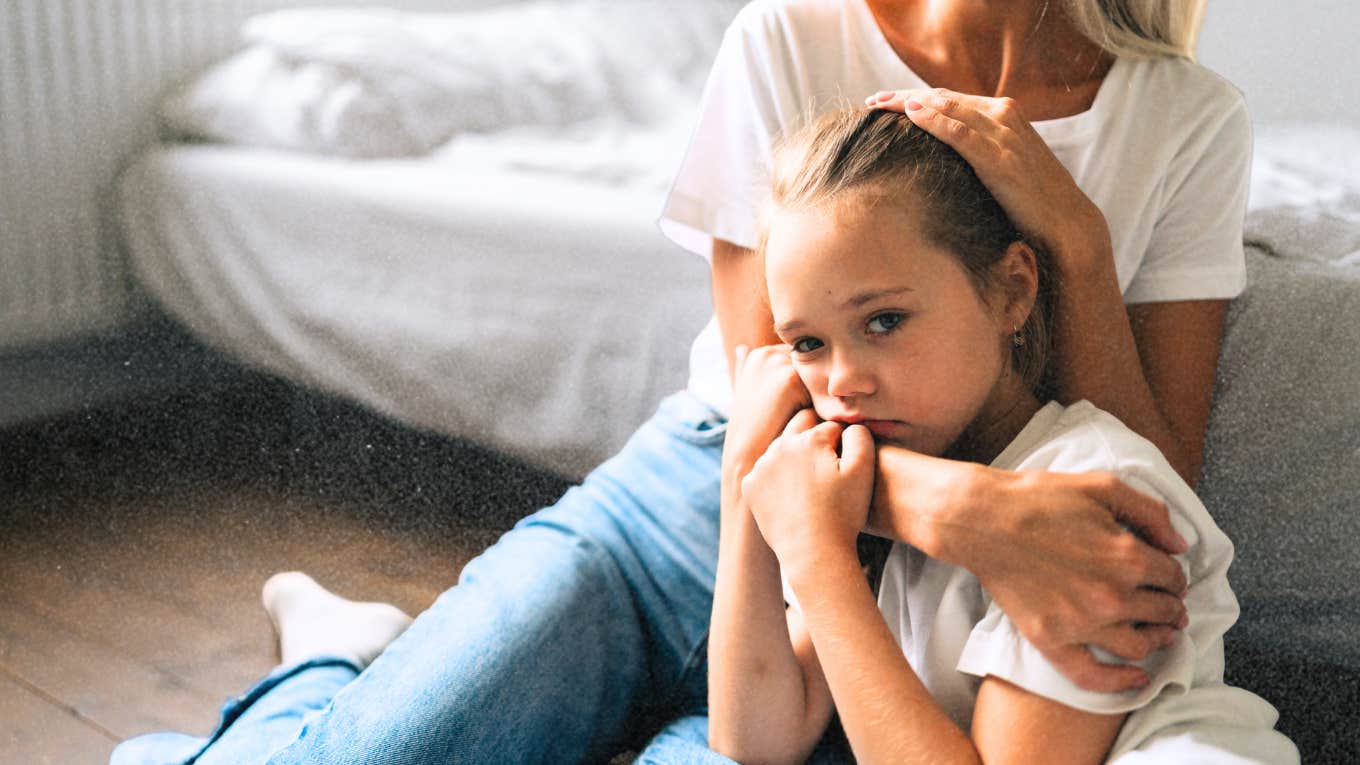 Parenting Advice To Help Ease The Heartbreak & Effects of Divorce On Children mother easing daughters heartbreak after divorce