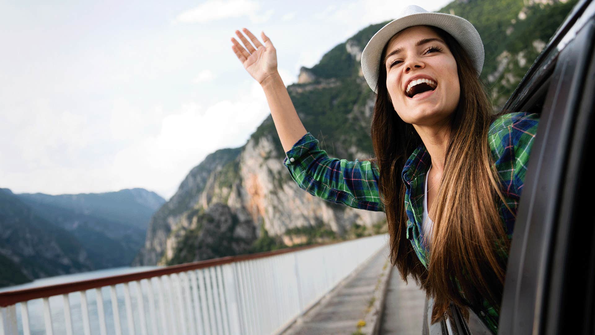 happy woman taking a selfie outdoors