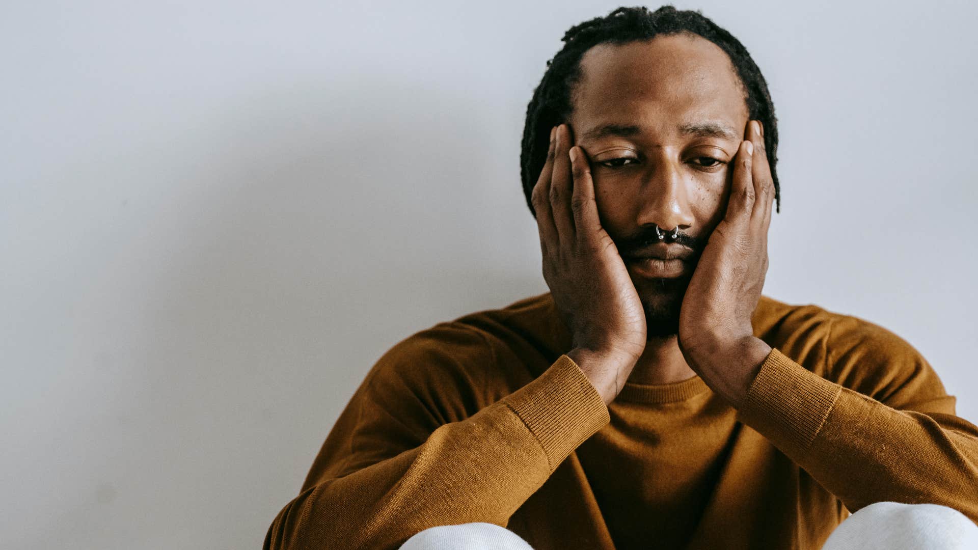 man thinking about his mistakes
