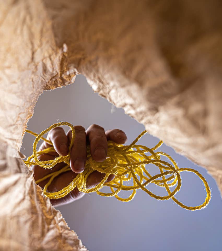 throw away tangled string as concept for healing from family enmeshment