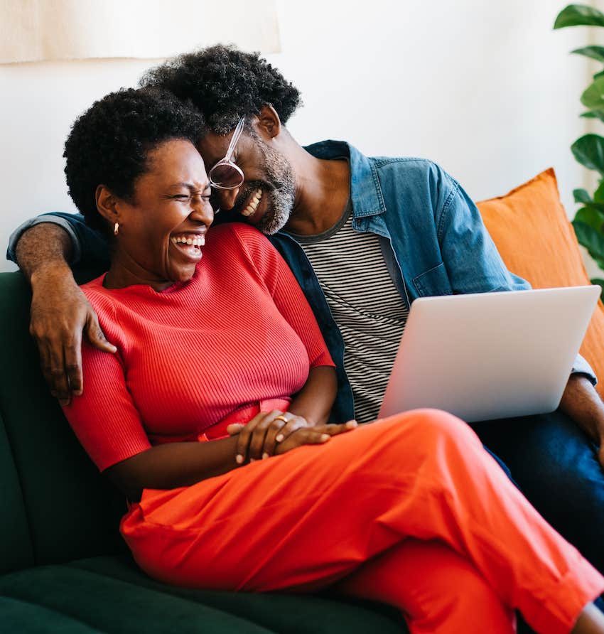 Close couple hug and laugh to keep a long-term relationship