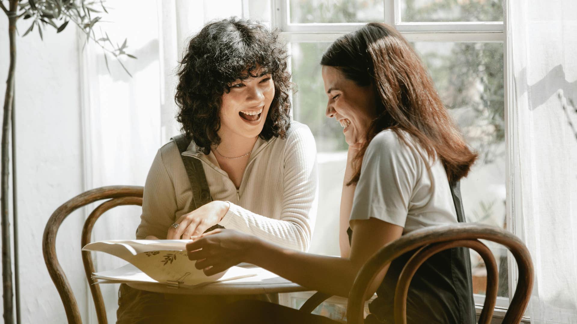 women discussing competition
