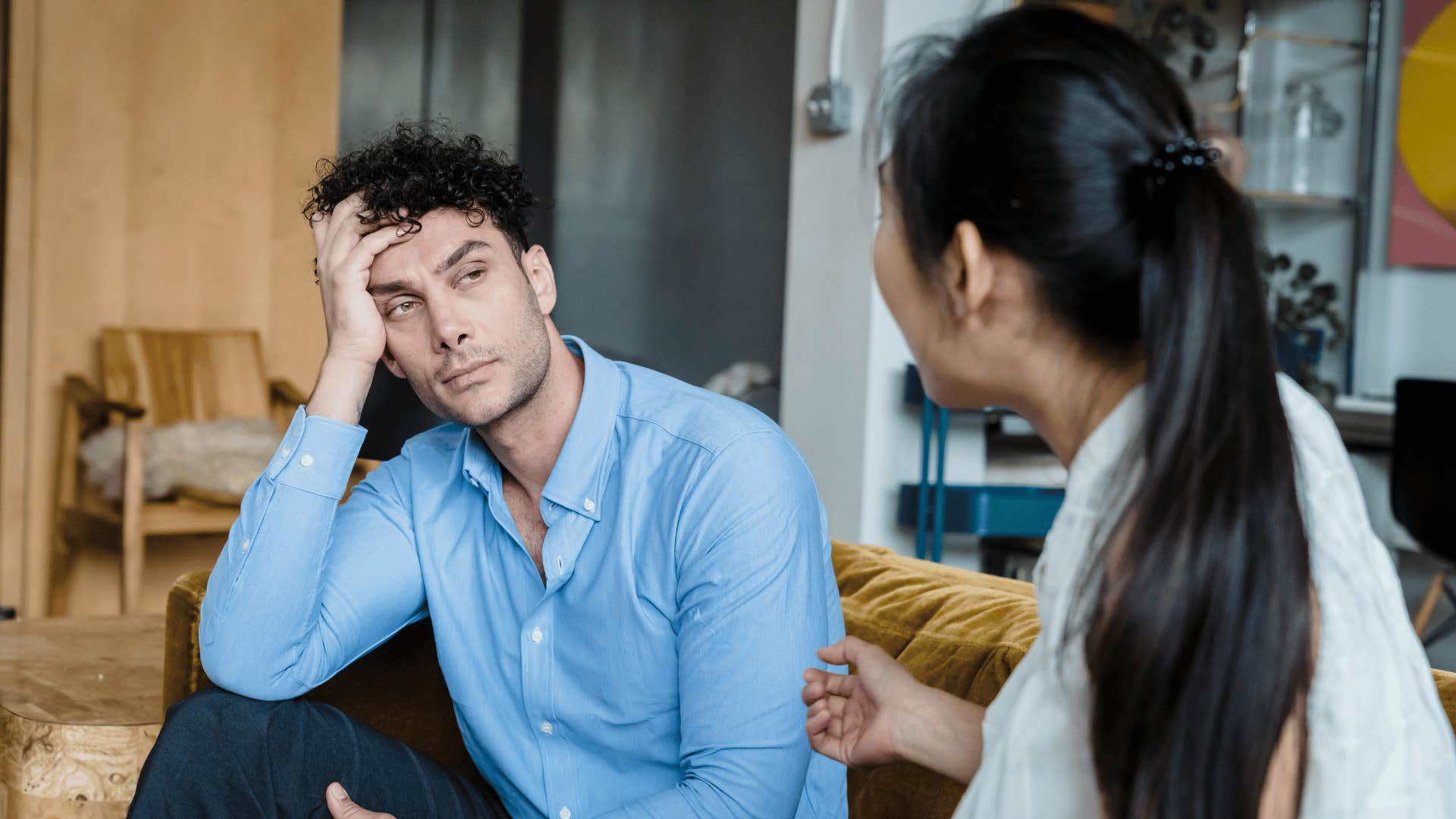 annoyed man being questioned