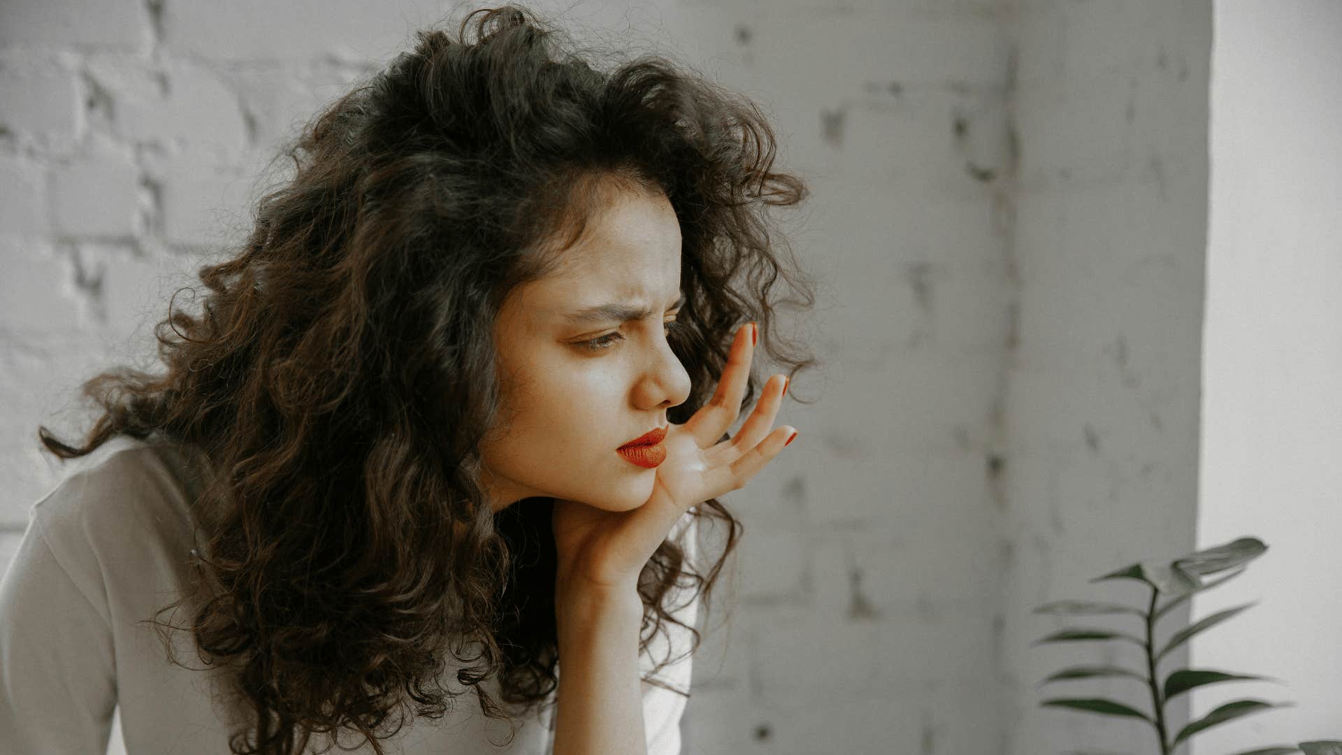 unhappy woman thinking
