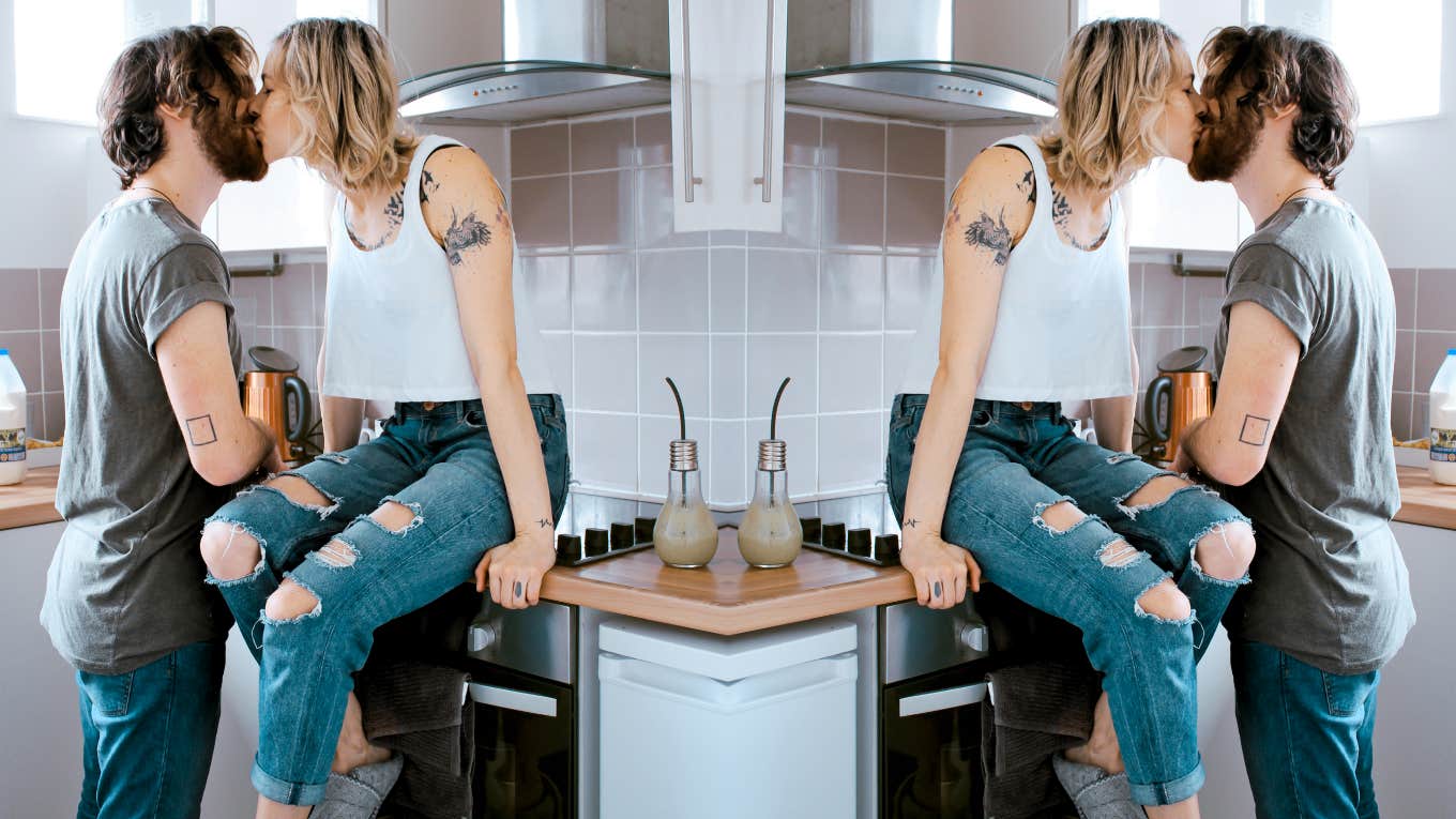 Healthy relationship, couple kissing in kitchen 