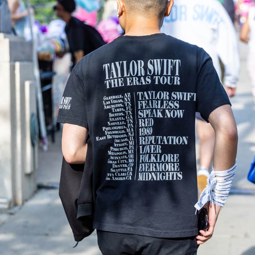 person wearing Eras Tour shirt 