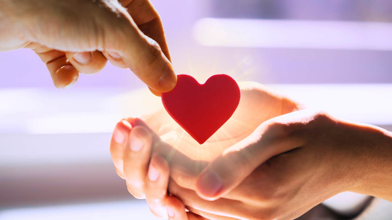 How To Show Your Love & Commitment In A Relationship Hands show how to tangibly prove love and commitment in a relationship.