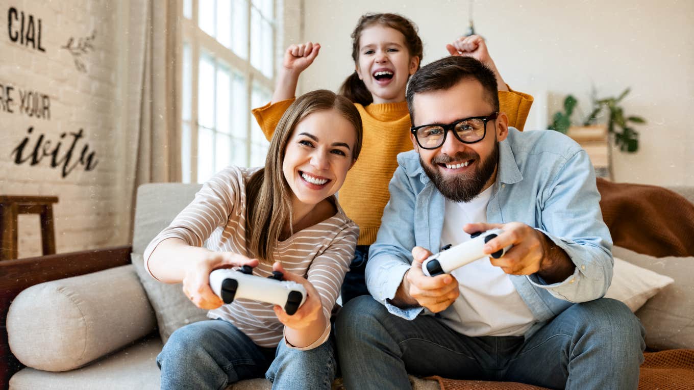 Tips for a Healthy Post-Divorce Adjustment Co-parenting cordially for their child. Playing a video game together