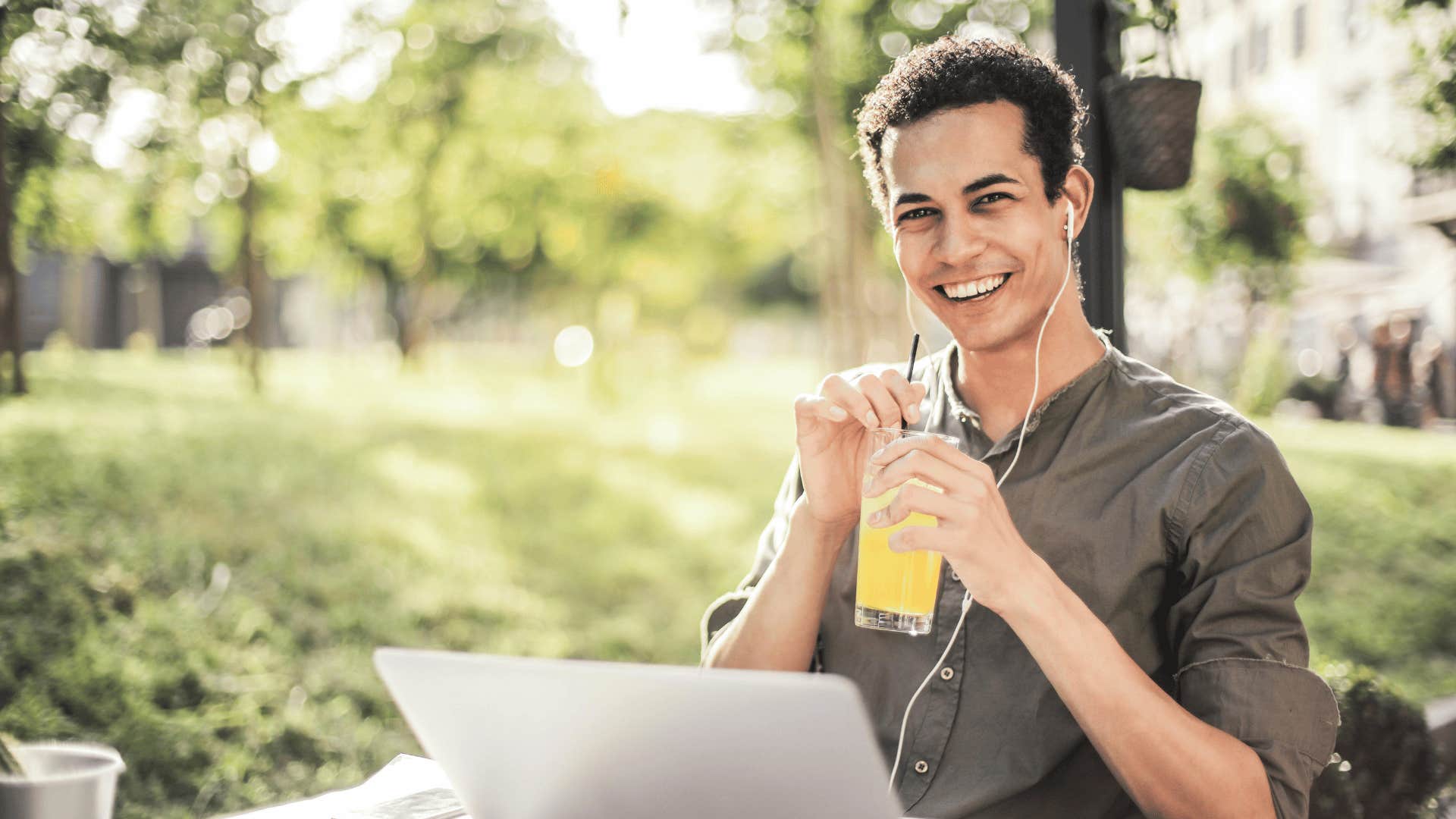 man relaxing with drink