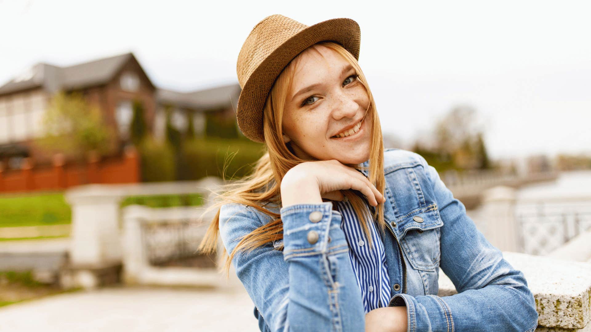 smiling woman who loves herself