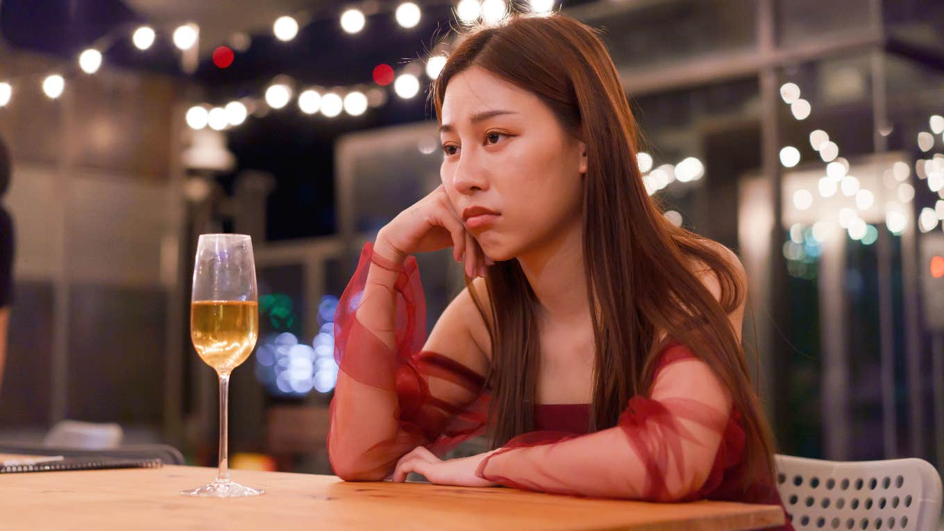 Why This Type Of Relationship Never Works Out woman drinking alone looking upset