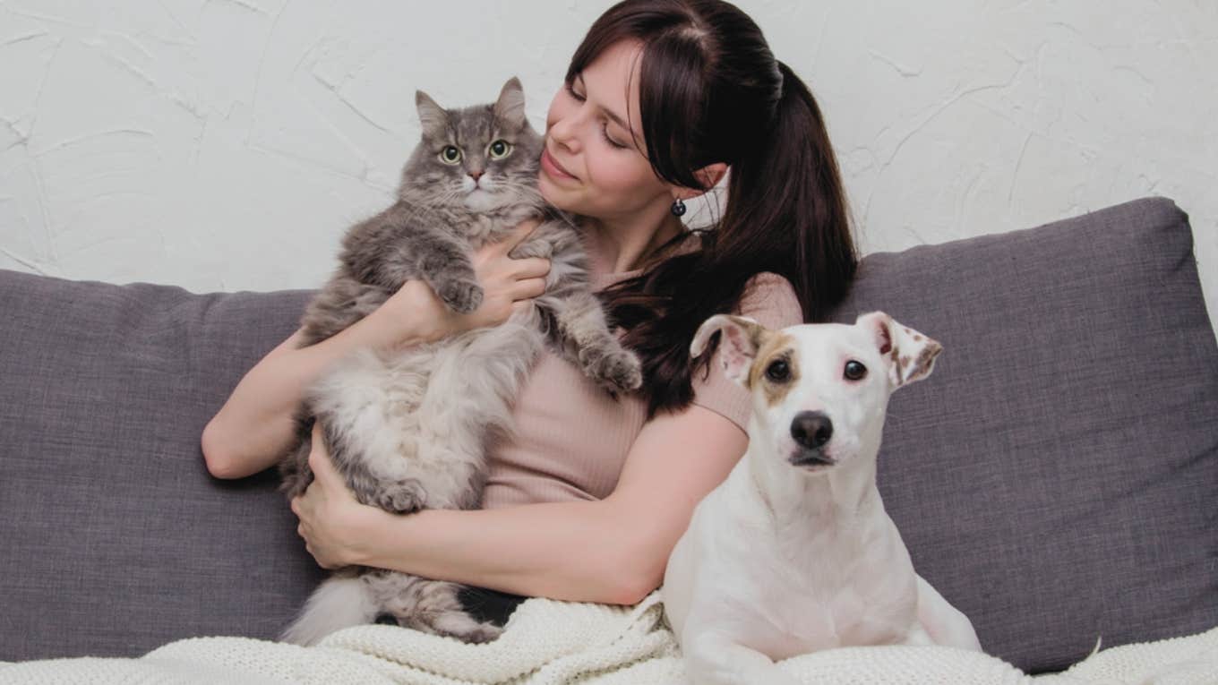 woman, cat, dog 