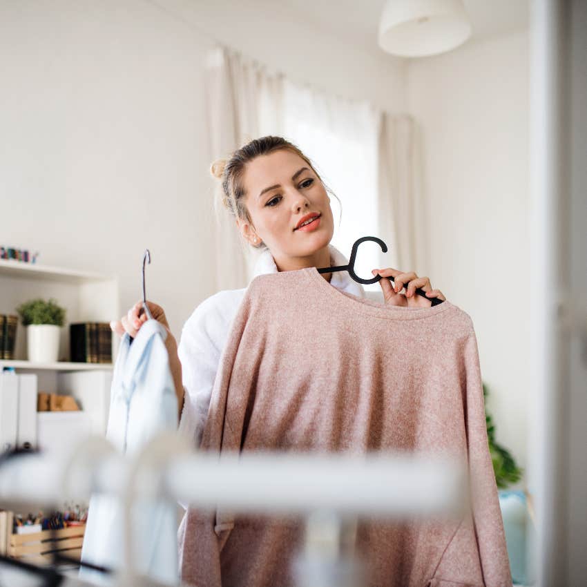 woman choosing an outfit