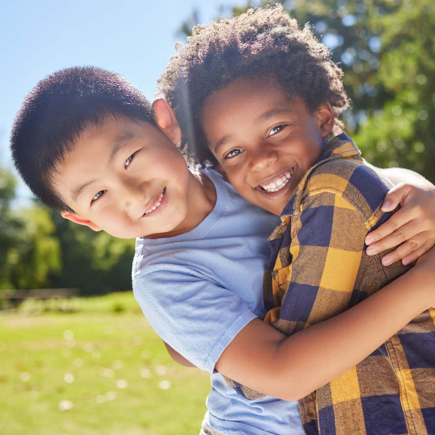 Young boys hugging