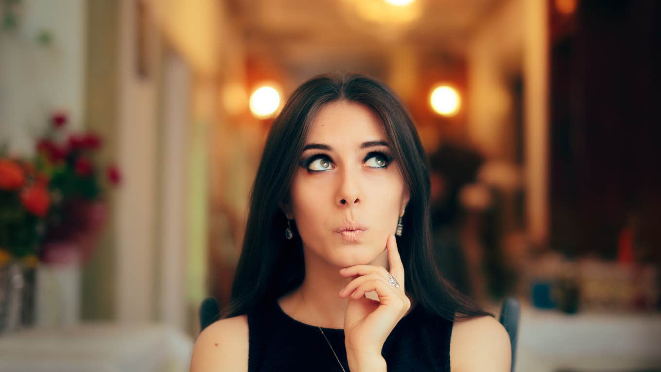 Emotional distractiosn keeping you from what you want Woman distracted, looking up