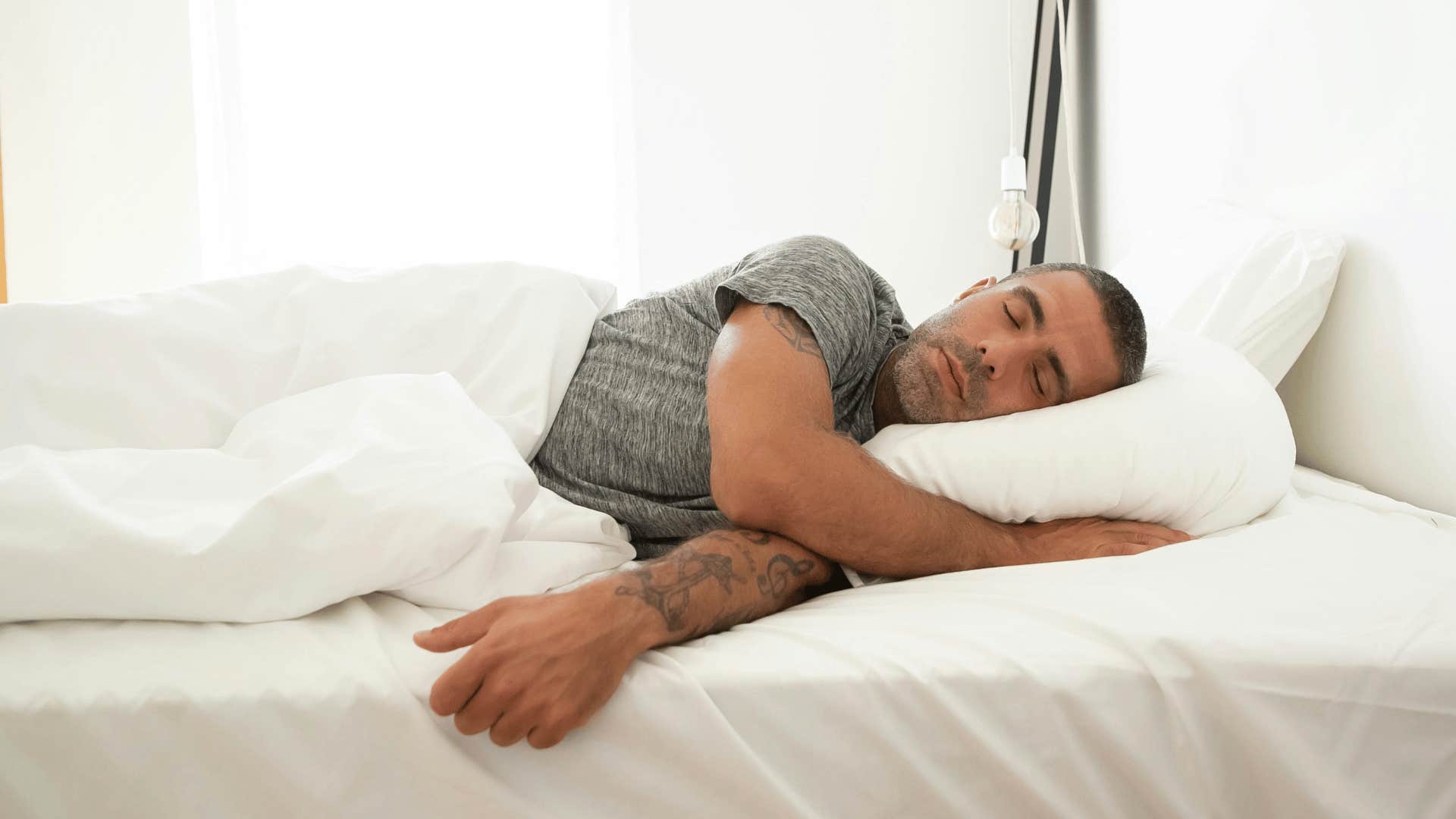 man sleeping in too late