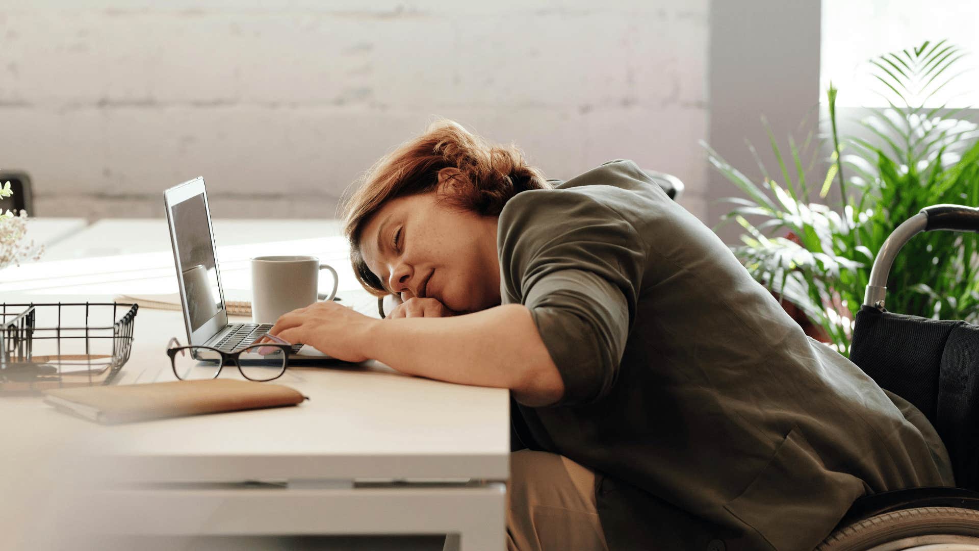 woman falling asleep at work