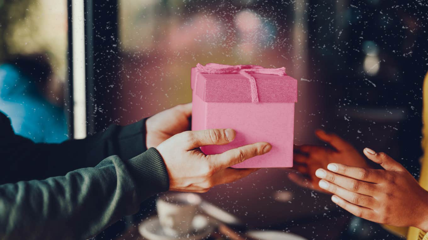 Do You Have A Generous Relationship? Questions To Ask Generous person hands off gift to the person he is in a relationship with.