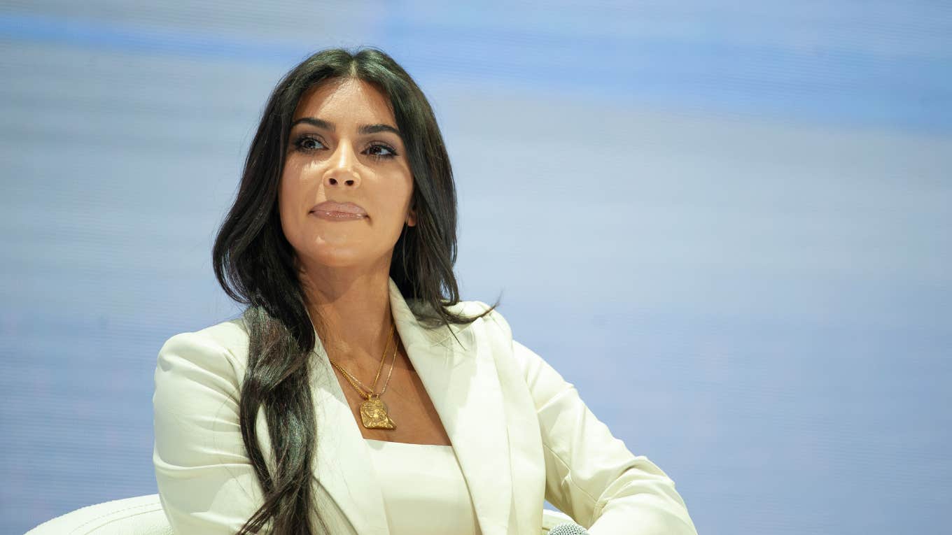 Kim Kardashian Reveals The Parenting Advice A Therapist Gave Her To Help Her Kids Behave Better Kim Kardashian looking serious in white suit