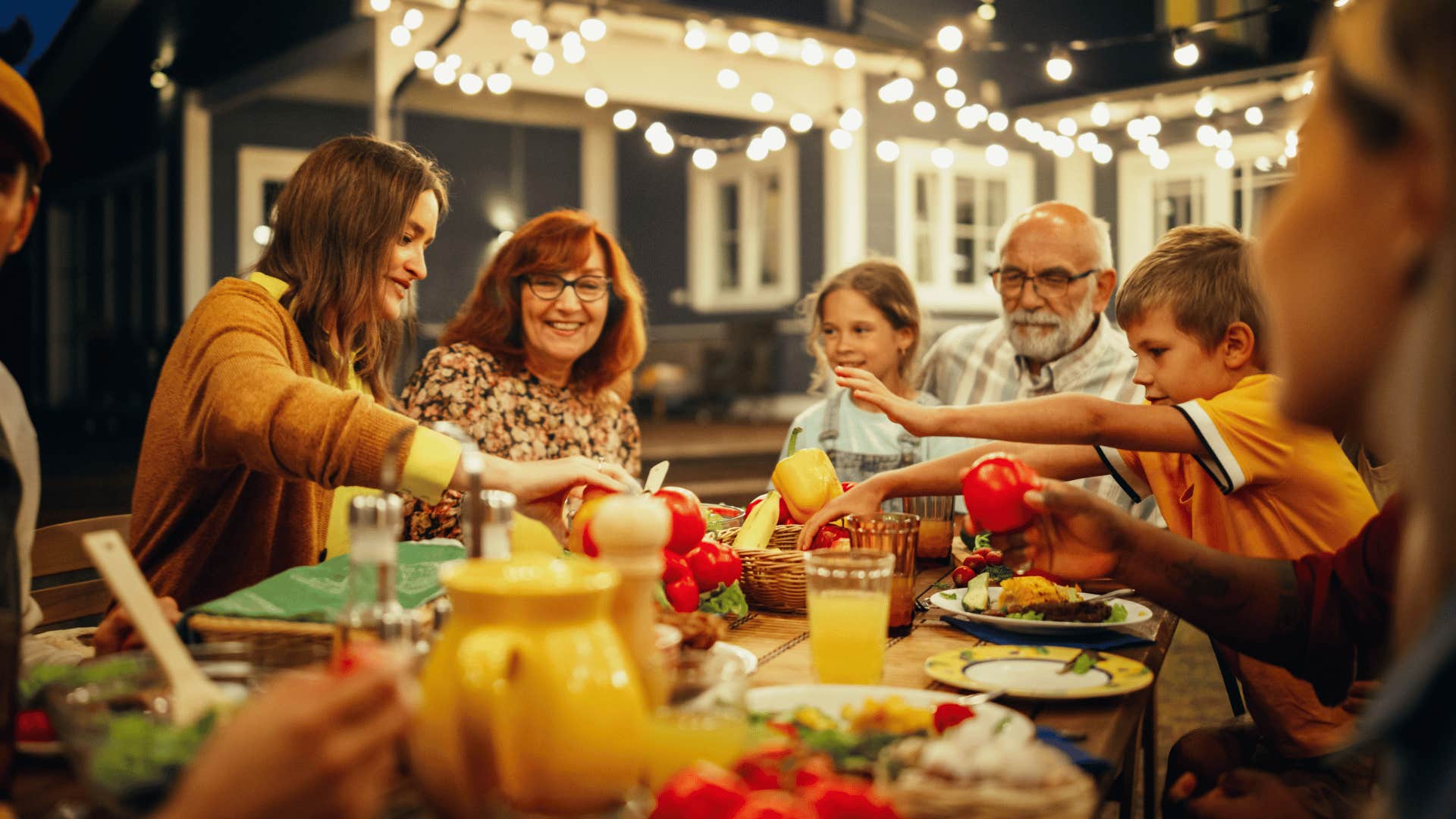 family hanging out together and eating dinner
