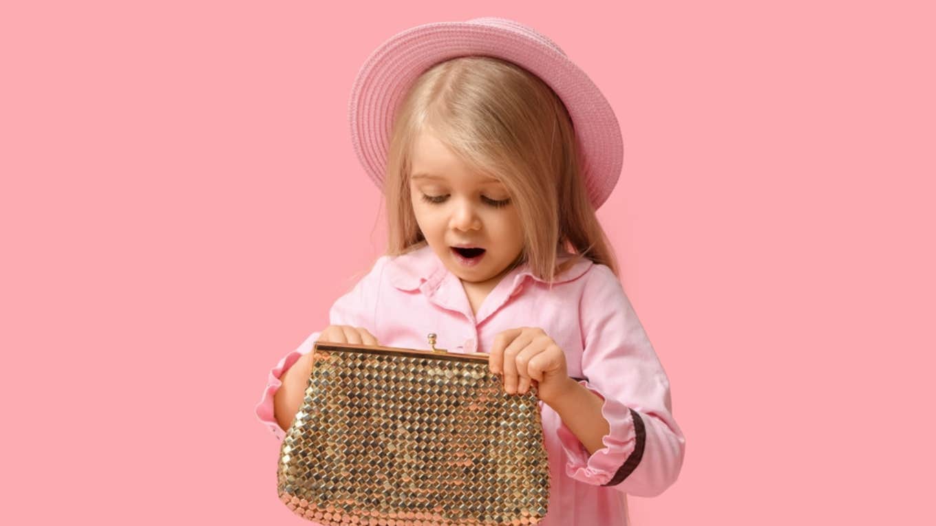 Little Girl Shares The Essential Contents Of Her Designer Handbag little girl, purse