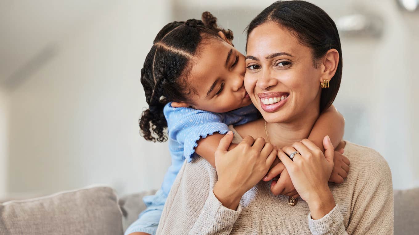 Mom Wonders If Parents Secretly Have A ‘Favorite’ Child New mom hugging her favorite child.