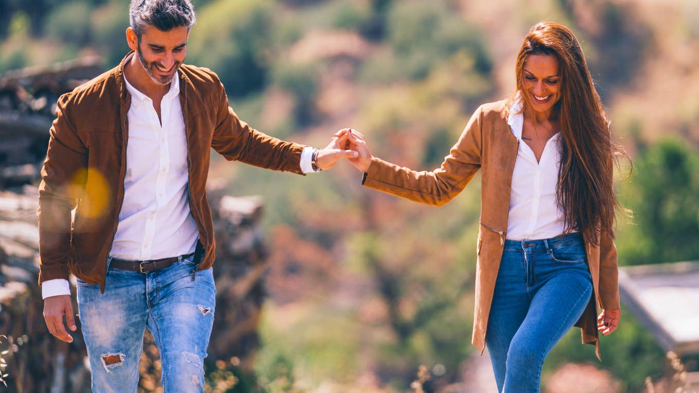 People Who Focus On These 4 Things Create The Most Secure Attachments securely attached couple holding hands