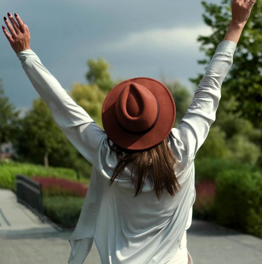 With her arms stretched to the sky, she has released emotional pain