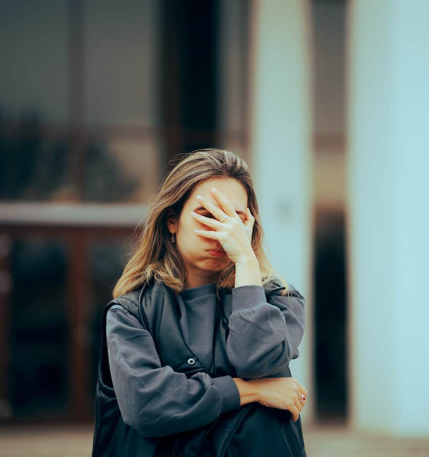 Palm to face, she feels the pain of divorce