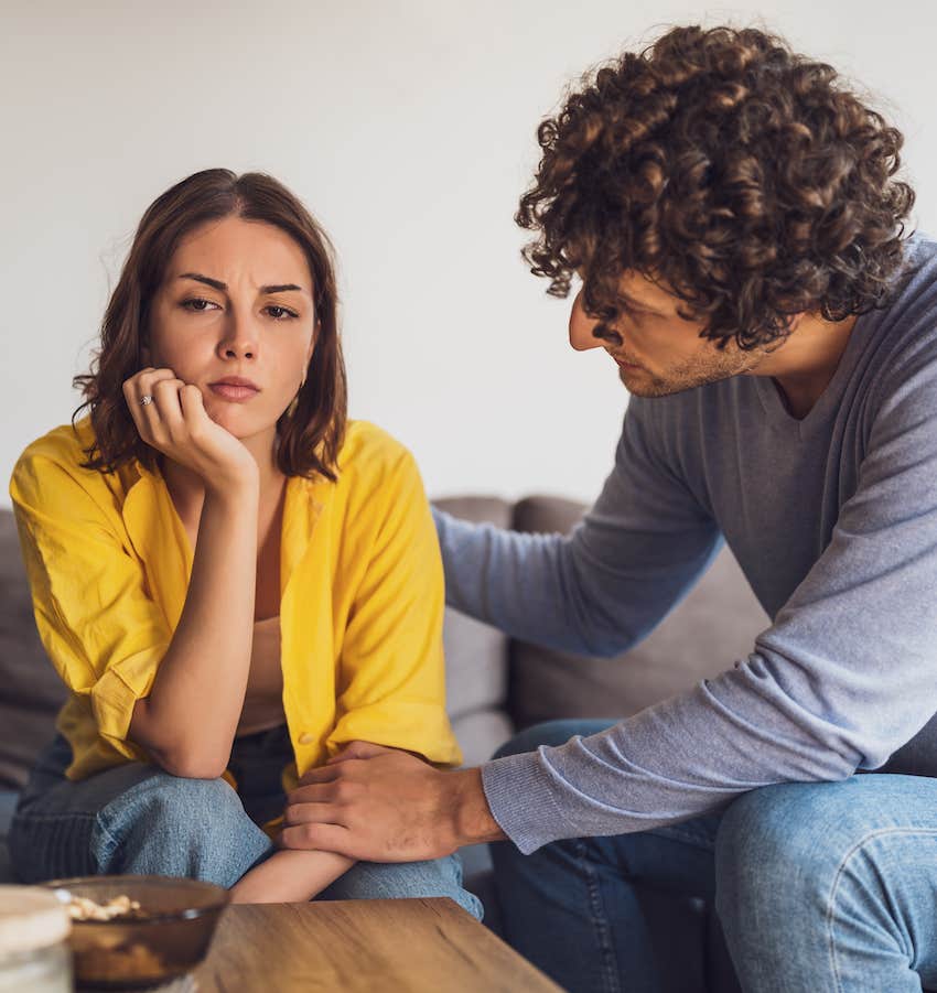Unhappy couple on a couch realize the relationship won't last
