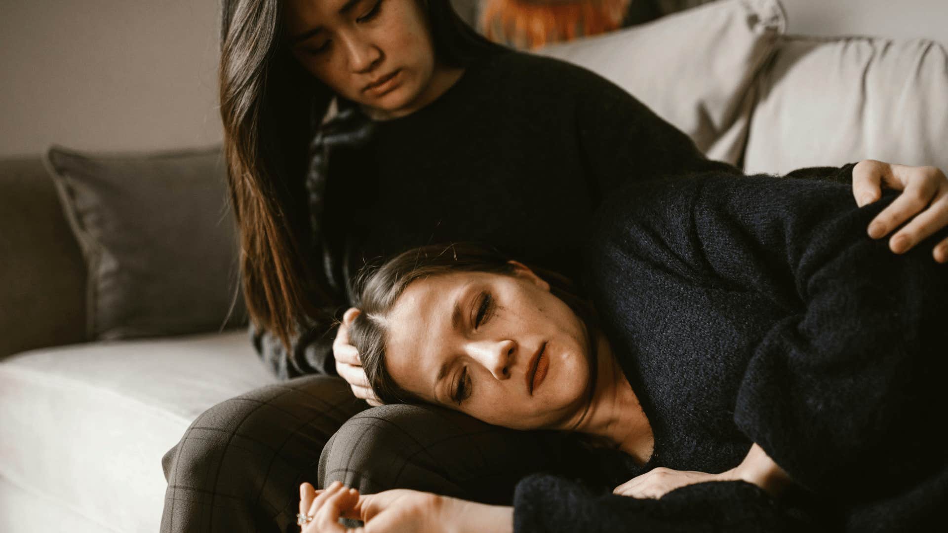 woman comforting another woman lonely