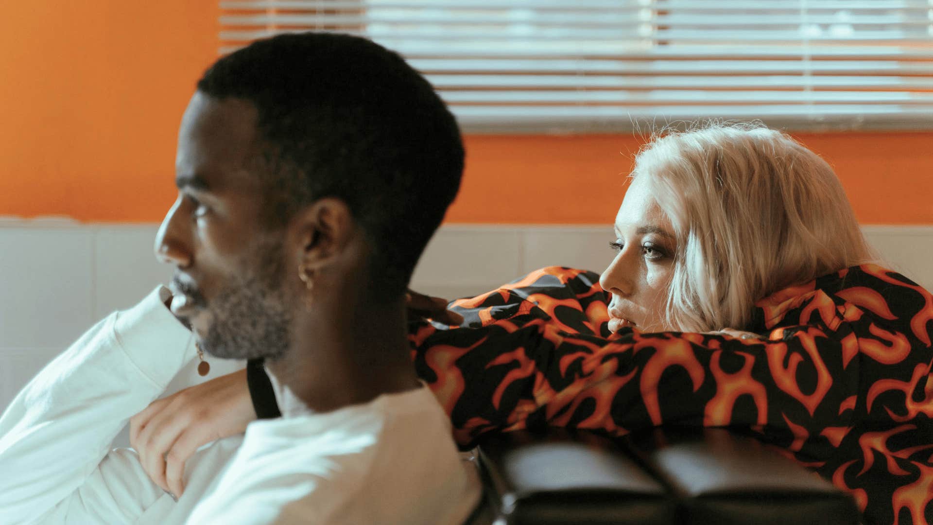 woman trying to get mans attention