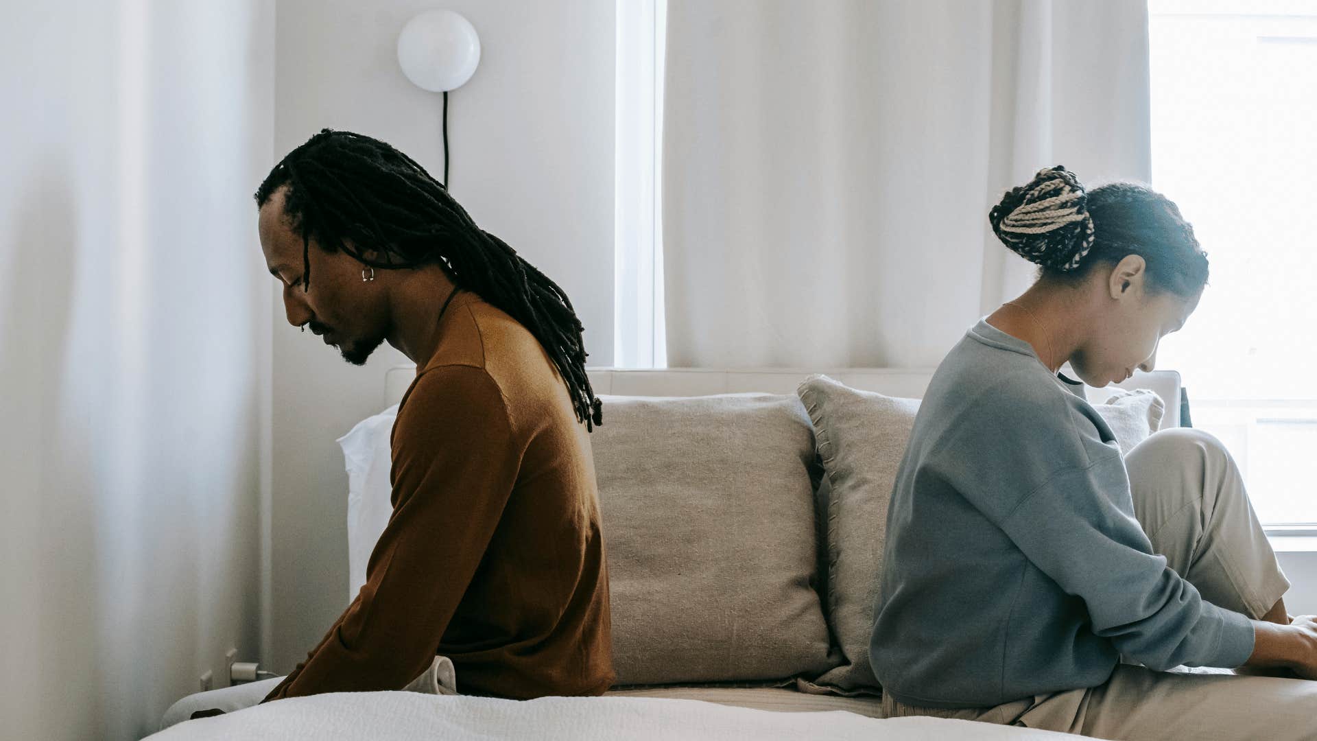 couple ignoring each other