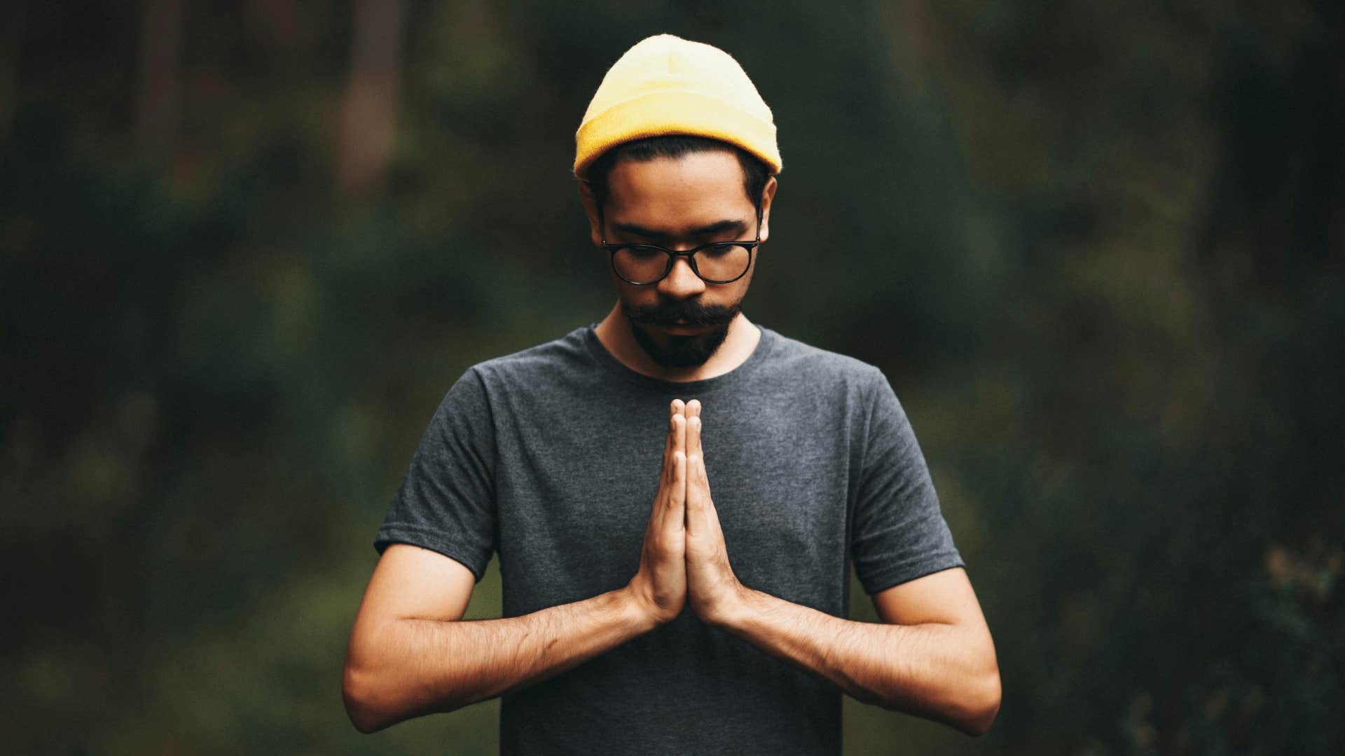 grateful man with prayer hands