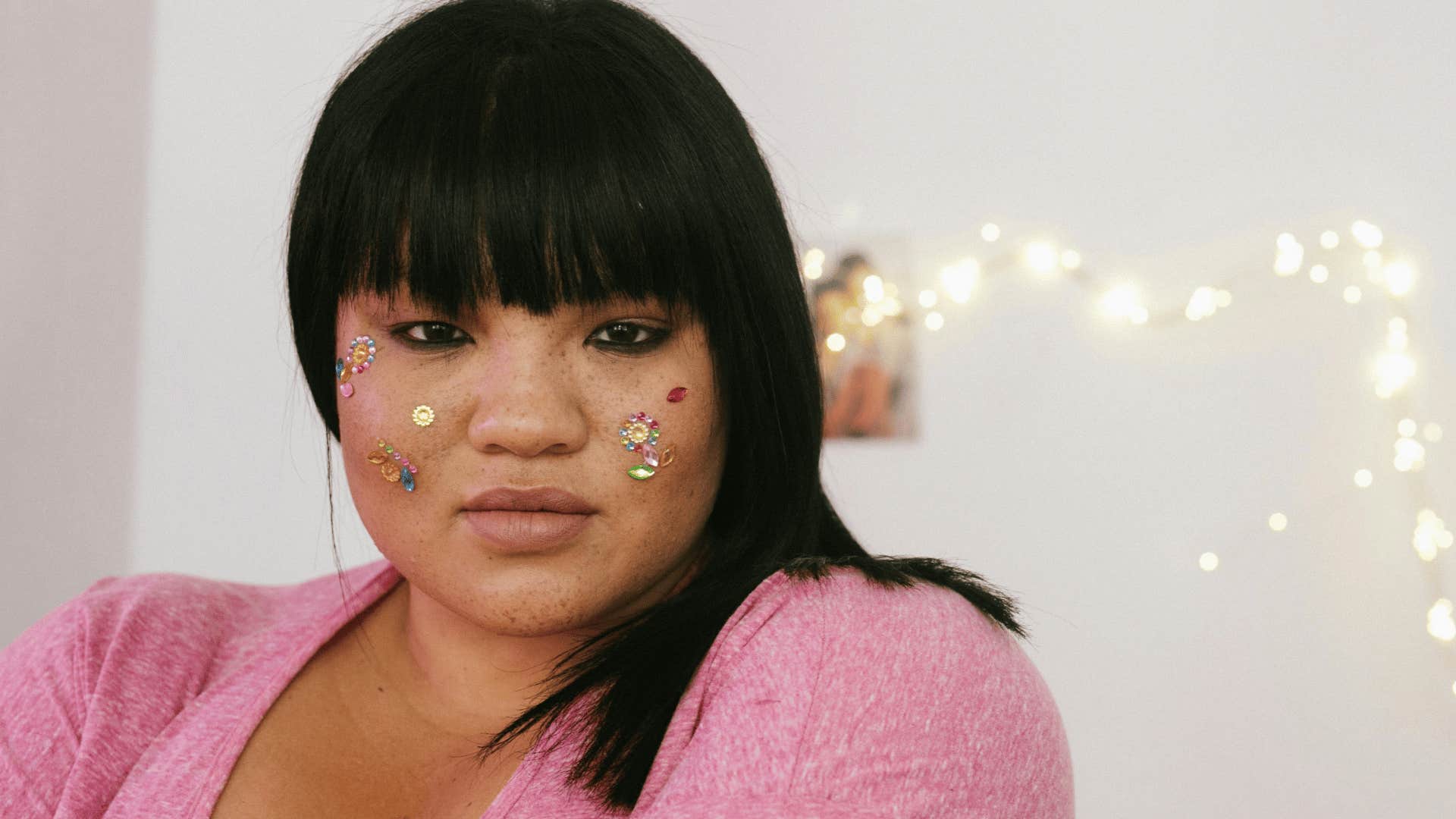 woman thinking with sparkles on face