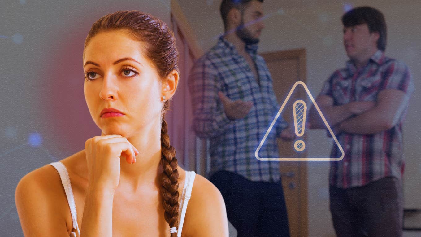 The Toxic Reason You're Attracted To All The Wrong People Woman ponders the toxic reason she is attracted to the wrong men standing behind her.