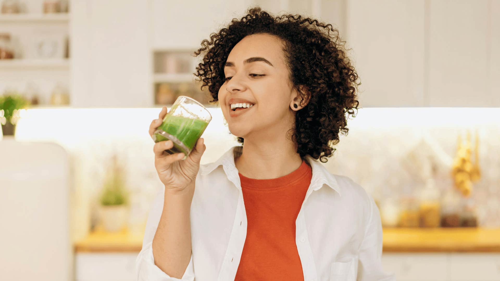 woman drinking healthy smoothie