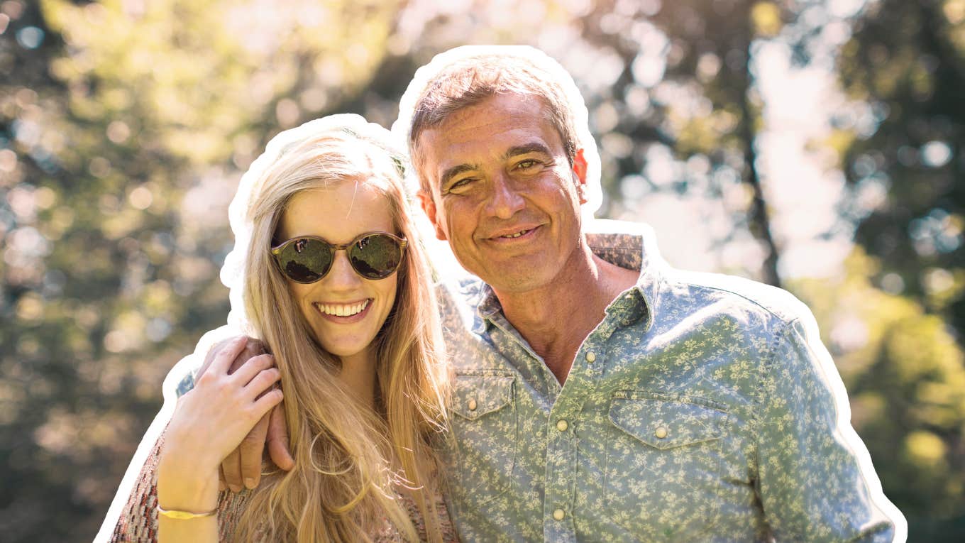 How to make age gap relationships work Couple wiht a wide age gap, outdoors in the trees, smiling pleasantly