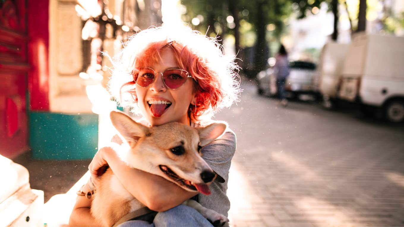 Being 'Purposefully Single' Is Getting Political — But Is It Warranted? Single woman and her dog