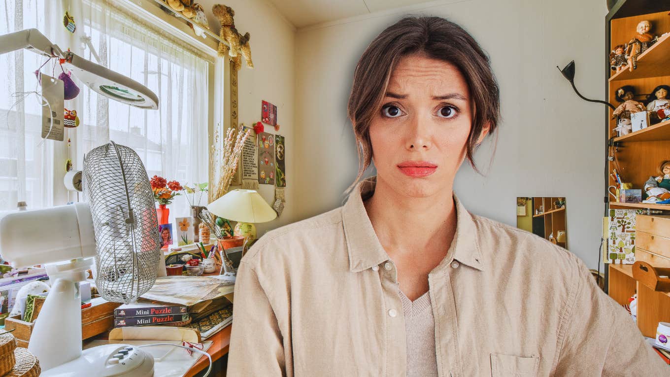 Ways The Clutter In Your Home Is Making You Sick Woman in cluttered house