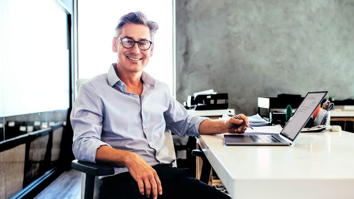 I Was Called 'Crazy' For Quitting My Job Without Another Offer — But Now I Make Triple The Salary Happy man at new job after quitting without another offer