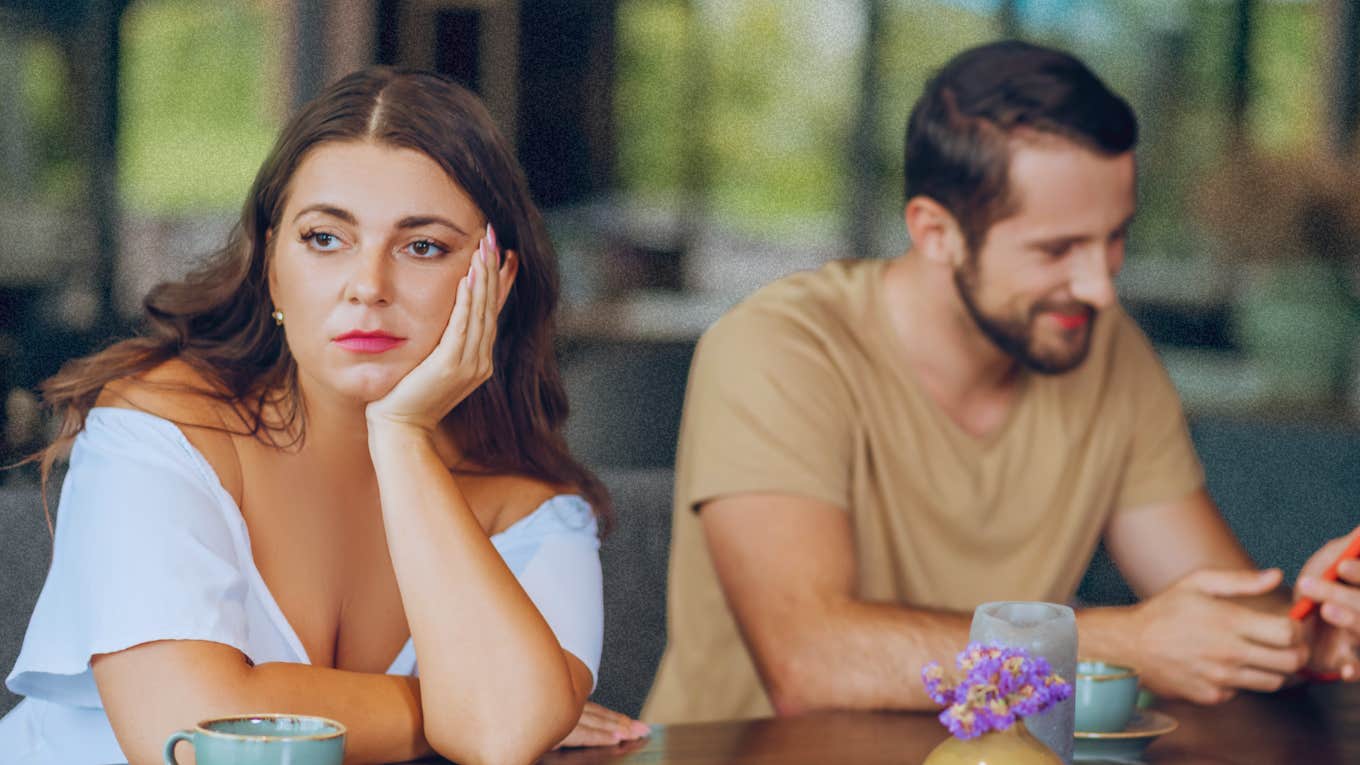 Signs You're Not Getting Enough Commitment From A Partner Woman notices signs that her partner is not committed enough.
