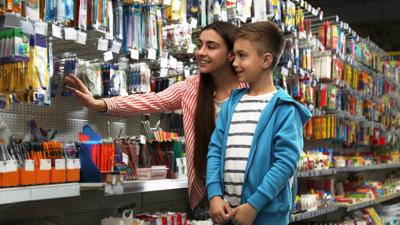 Former Teacher Insists It Shouldn't Be Parent's Job To Buy Communal School Supplies Little boy with mother choosing school stationery in supermarket