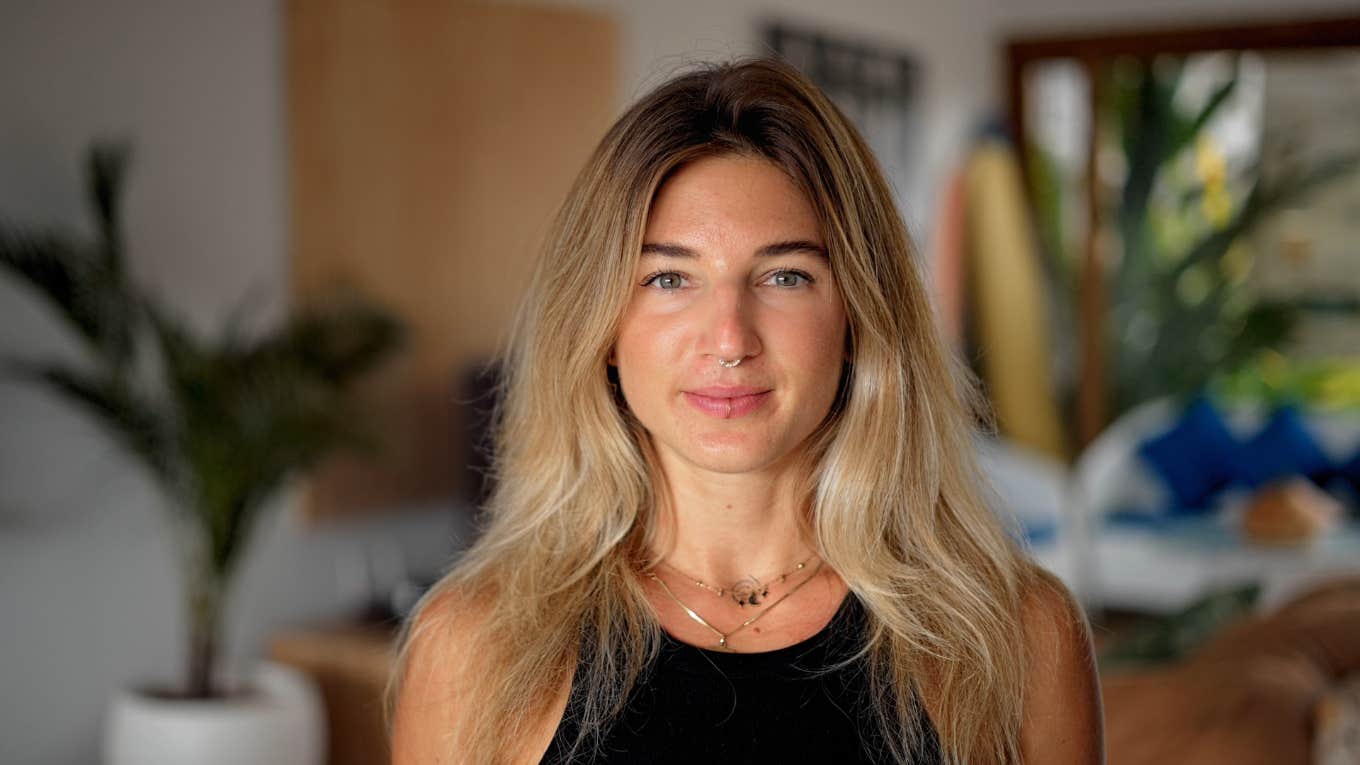 Gen Zer Claims She Hasn't Recovered Financially Since 2020 Gen Z woman with slight smile