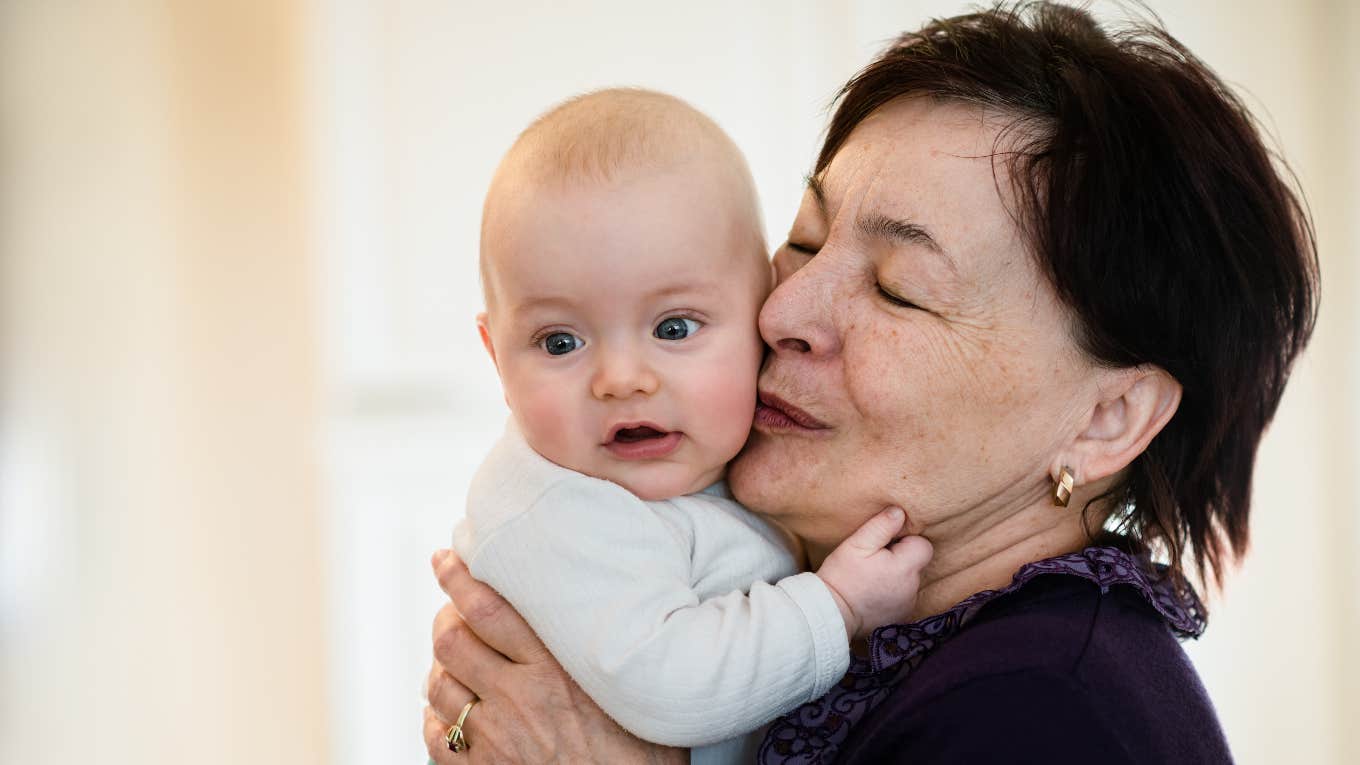 Grandma Tells Other Grandparents To Stop Calling Their Grandchild My Baby Grandma holding grandchild