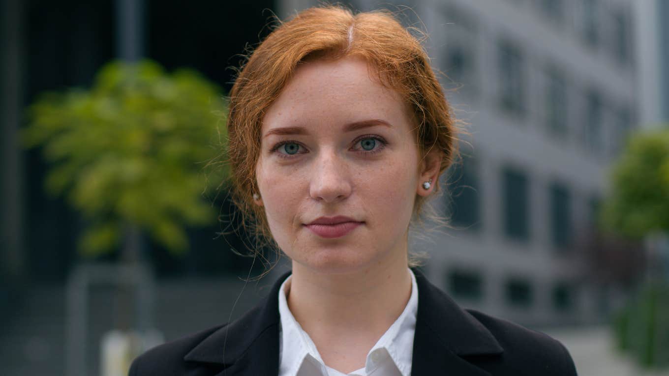 Happiness Lessons That Most People Learn Too Late In Life redheaded woman looking serious thinking about life lessons