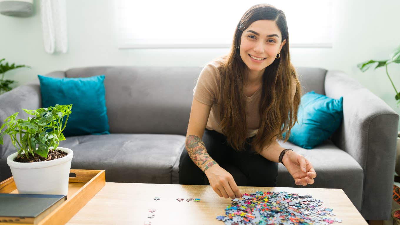 Introverted Woman Shares 6 ‘Cozy Hobbies’ You Can Try While Alone Introverted woman doing a cozy hobby alone