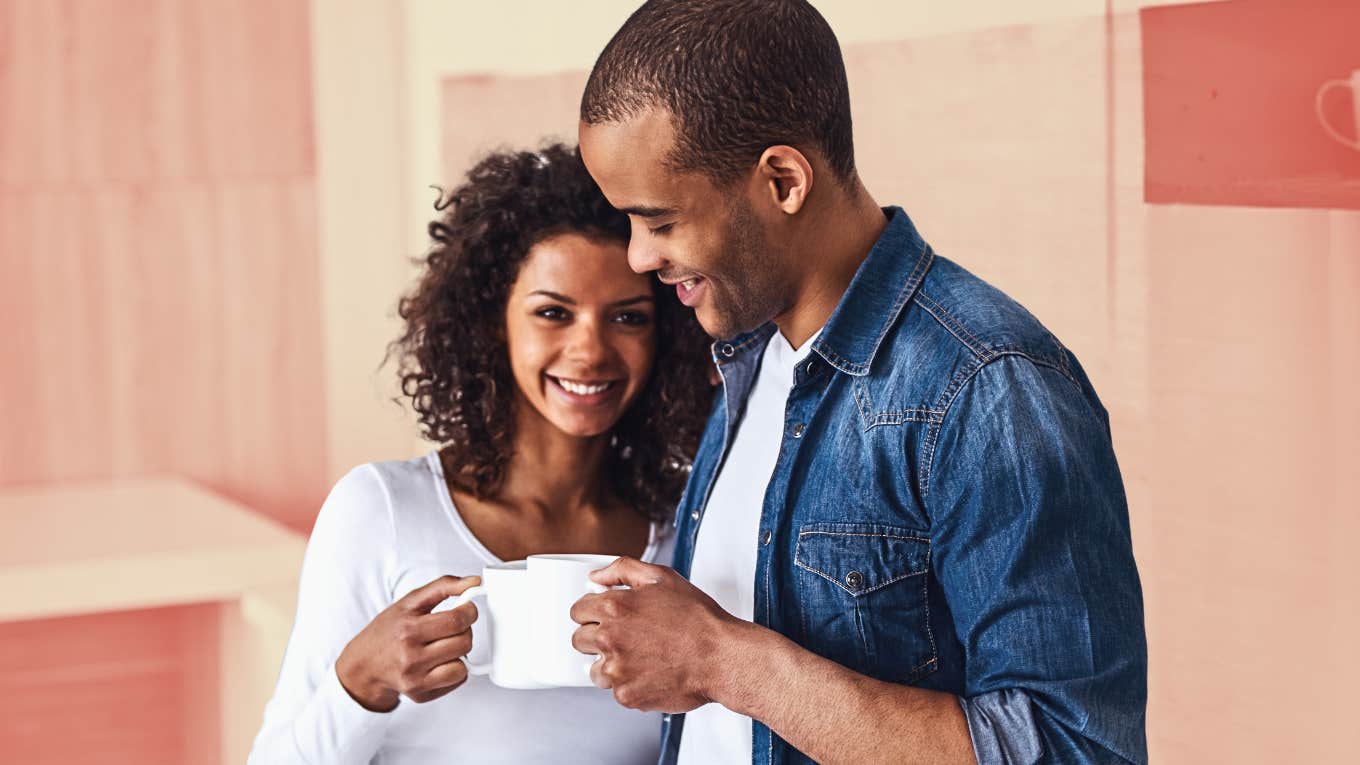 How to keep your partner close when they start drifiting away Couple in kitchen keeping each other close