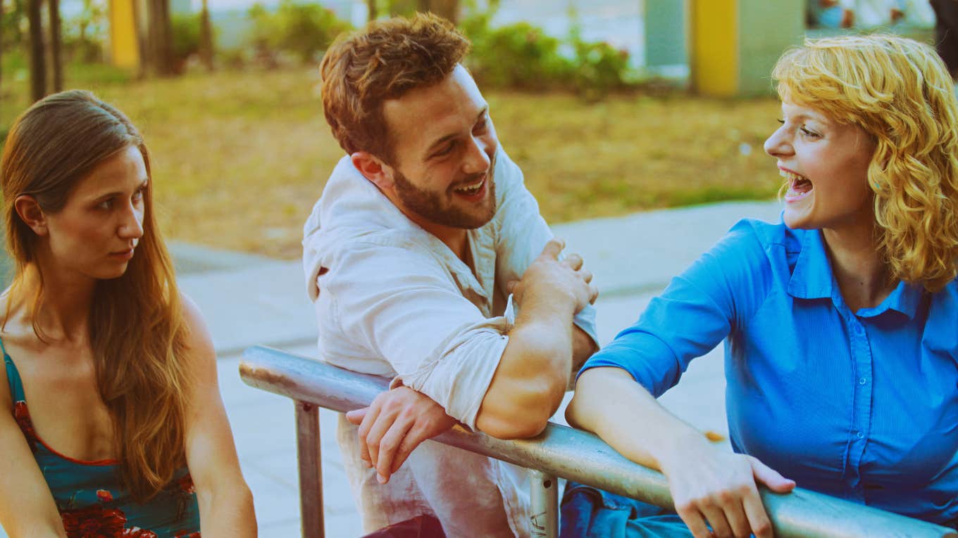 Therapist Reveals What It Means When Men Check Out Other Women In Front Of You Man checks out other women in front of partner.