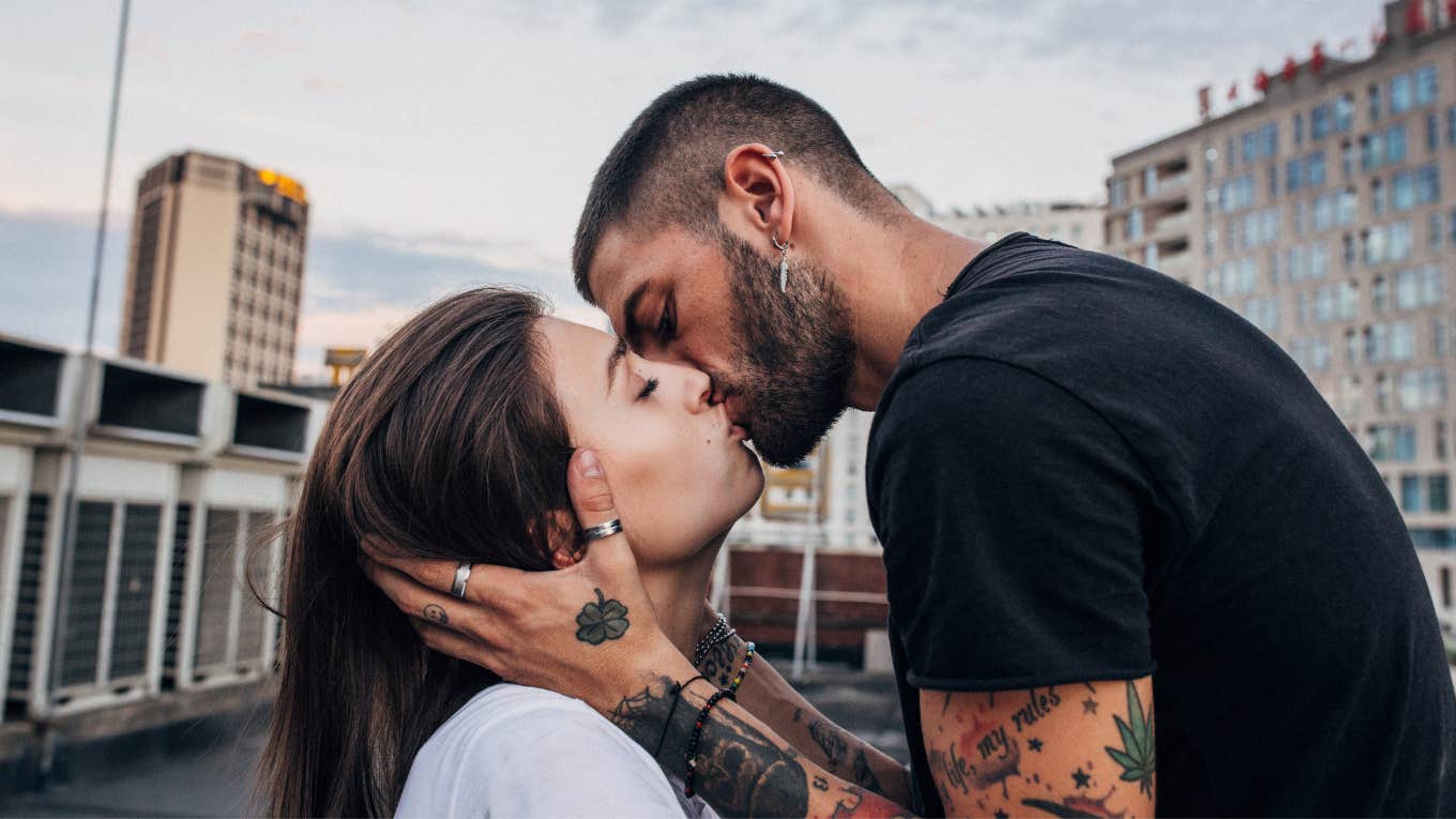 The 'Rare' Types Of Intimacy The Happiest Couples Have, According To Psychology Happy couple sharing intimate kiss